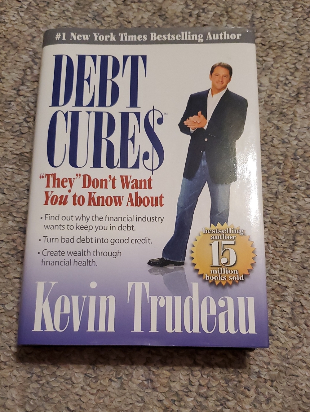 Debt Cures by Kevin Trudeau — White & Purple Cover
